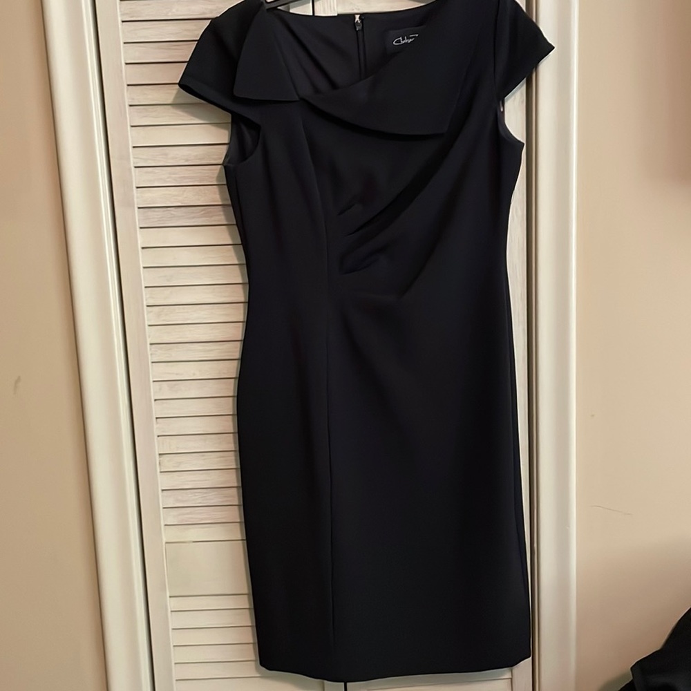 Very nice black dress!  NWOT. Size 8.  Very classy for night out or business.